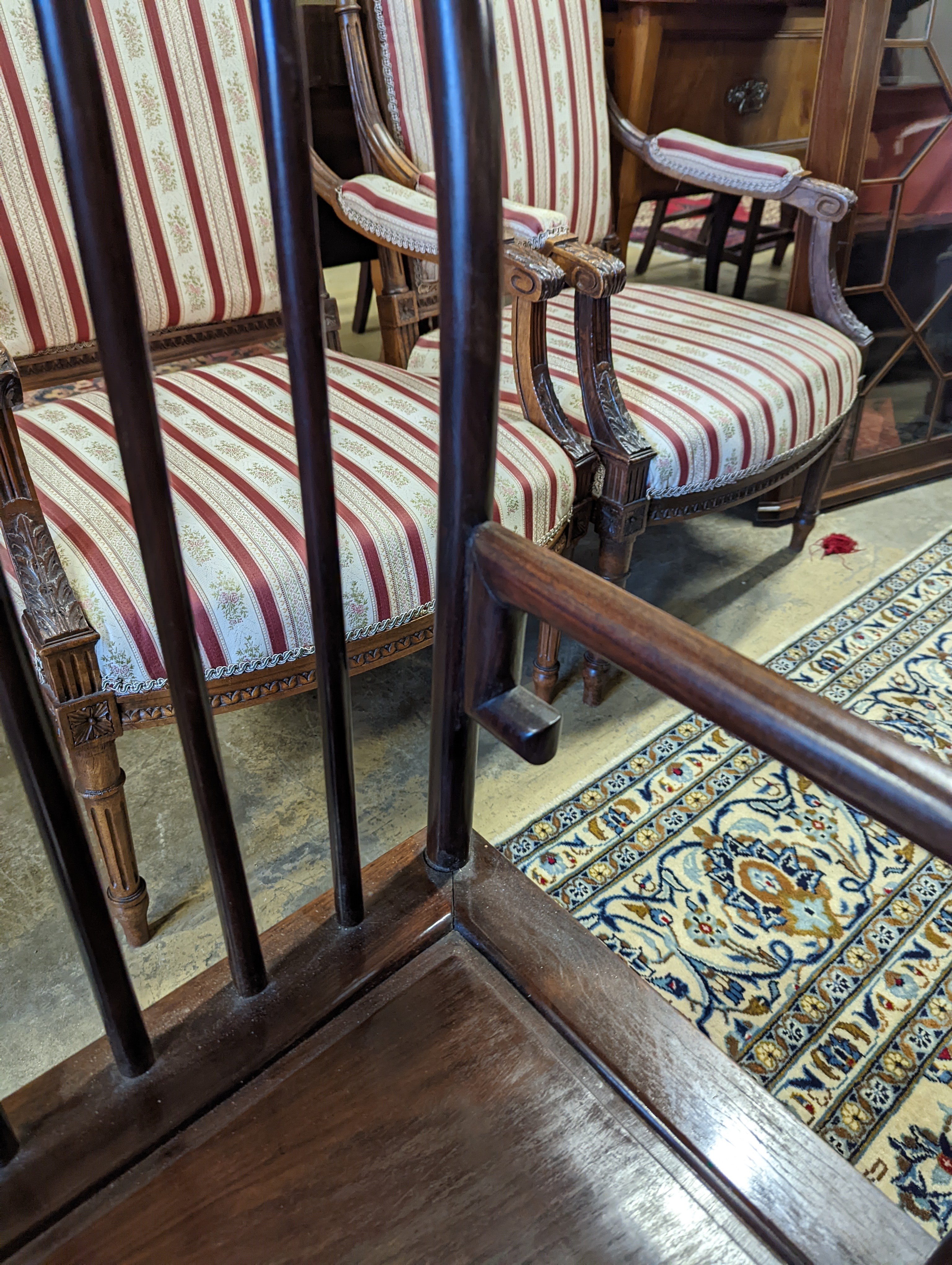 A pair of mid 20th century Chinese Hongmu elbow chairs with cushion seats, width 58cm, depth 49cm, height 92cm